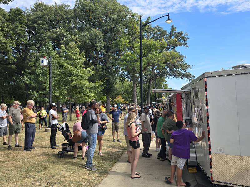 Lines start to grow mid-afternoon Saturday, Sept. 14, 2024, for food truck favorites during the Fall Food Truck Festival at City Park in Streator.