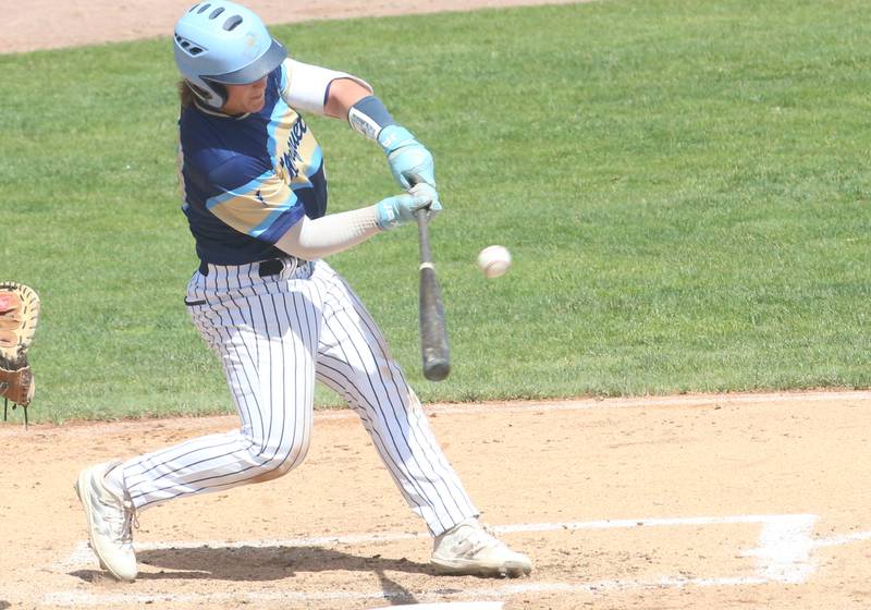 Marquette's Grand Dose smacks a hit against Routt during the Class 1A semifinal game on Friday, May 31, 2024 at Dozer Park in Peoria.