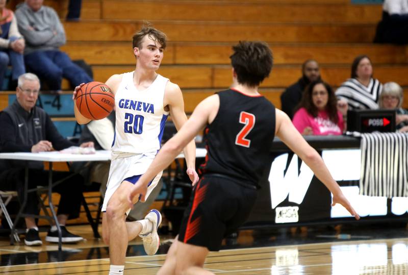 Geneva’s Jack Hatton dribbles the ball during a Class 4A Willowbrook Regional semifinal game against Geneva on Wednesday, Feb. 21, 2024.
