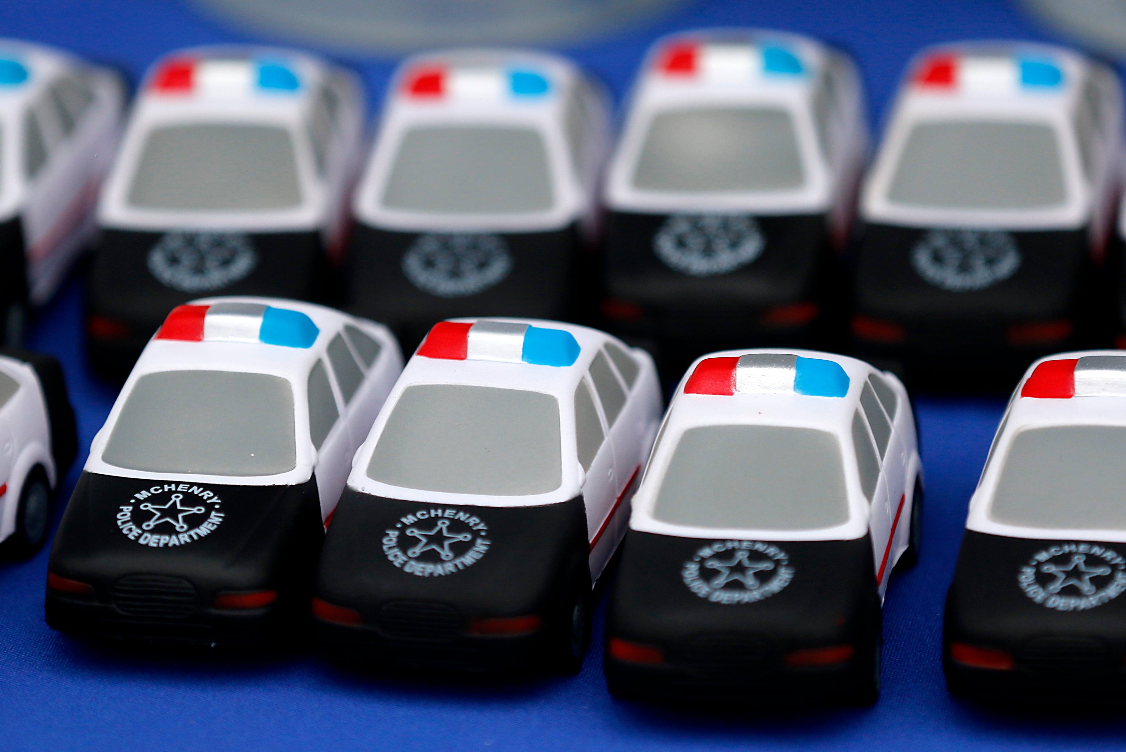 McHenry Police Department police car squishy toys wait to be handed out during a National Night Out event Tuesday, Aug. 6, 2024, at Petersen Park in McHenry. This year's event featured officers from the McHenry County Sheriff's Department, McHenry County Conservation District, and the McHenry and Johnsburg Police Departments, along with firefighters, public works officials, games, face-painting, K-9 and motorcycle demonstrations, food and family fun.