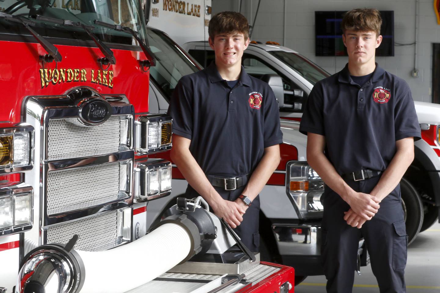 Twins Parker and Hunter Menzel, who will graduate from Woodstock North on Saturday, May 19, 2024, have already began working as Wonder Lake firefighters.