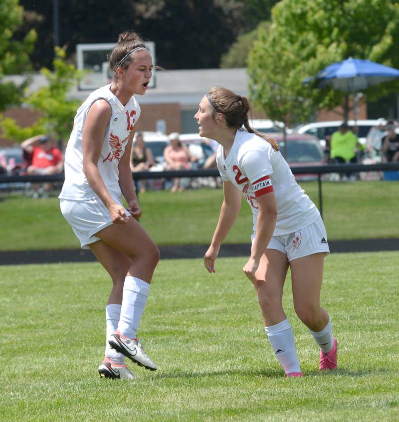 Oregon's Sarah Eckardt (left) and Anna Stender celebrate after Stender scored a goal on Eckardt's assist to give the Hawks their only score in a 2-1 loss to Stillman Valley at  the 1A Indian Creek Sectional on Saturday, May 18, 2024.