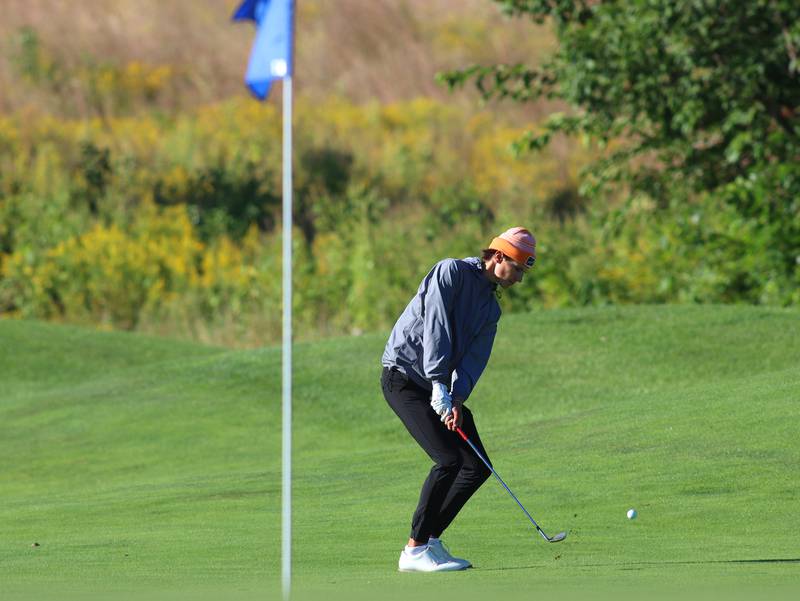 Prairie Ridge’s Jack Dahlem chips onto the 5th green in Cary-Grove High School 2024 Invitational varsity golf action on Saturday, Sept. 7, 2024, at Foxford Hills Golf Club in Cary.