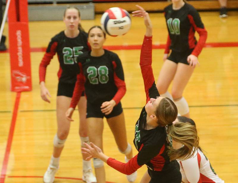 L-P's Aubrey Duttlinger sends a kill past the Geneseo side of the net in the Class 3A Regional on Tuesday, Oct. 24, 2023 at Sellett Gymnasium.