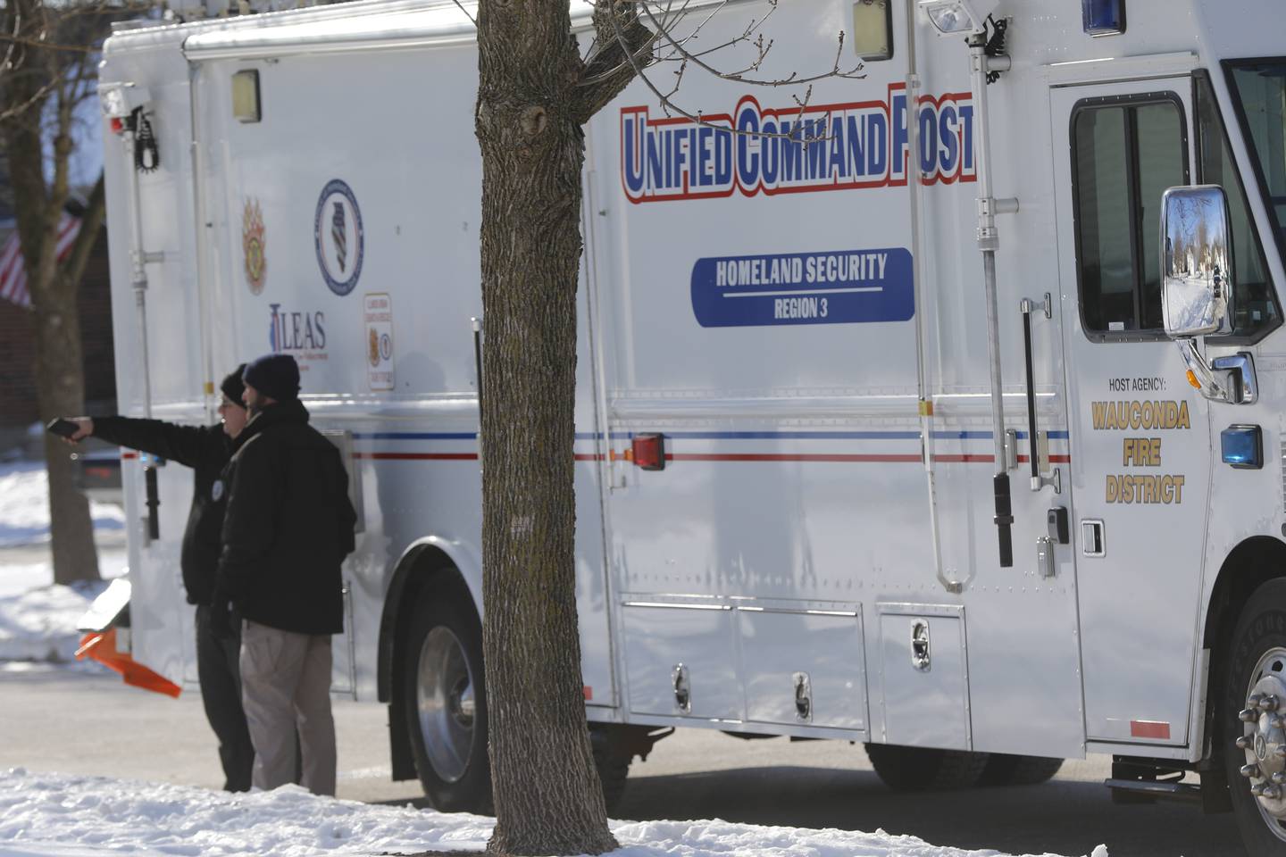 Investigators from multiple law enforcement agencies were probing the scene outside a Port Barrington home on Manchester Lane in the River Walk neighborhood on Tuesday, Jan. 11, after McHenry County Sheriff's Deputies shot and killed a person who allegedly opened gunfire on a woman and deputies in the early morning hours.