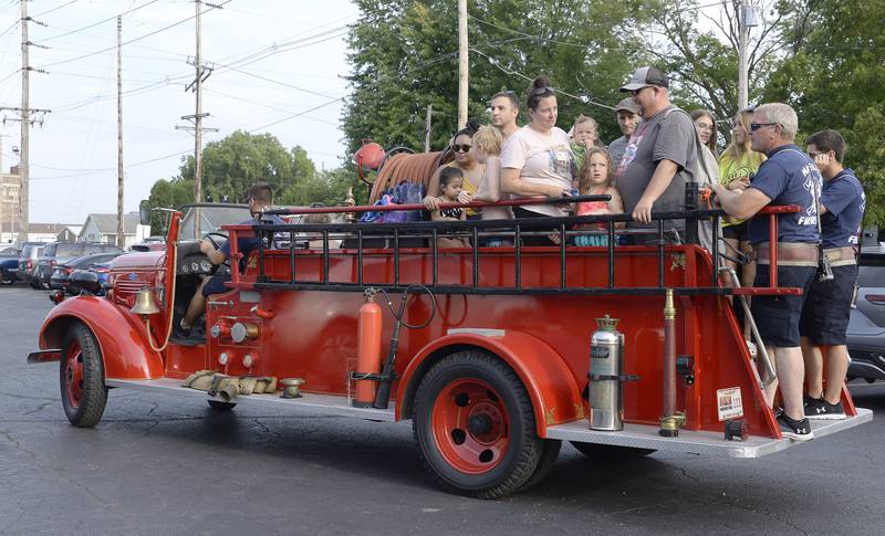 Many got to ride on the Marseilles Fire Department’s antique 1939 Chevy fire truck Tuesday, Aug. 1, 2023, at the Marseilles Pool during National Night Out.