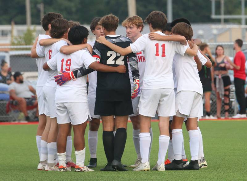 Members of the Ottawa soccer team huddle before playing L-P on Wednesday, Sept. 18, 2024 at the L-P Athletic Complex in La Salle.