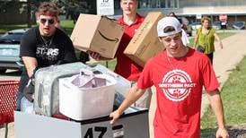 Photos: Hot weather greets NIU students as they arrive in DeKalb for move-in day
