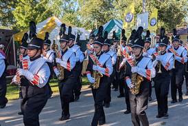 Sandwich High School band marches through fairgrounds to help open Sandwich Fair