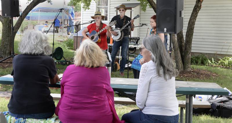 Katie Belle and Dufflebag entertained outside the Toll Collector's Office on Saturday, July 8, 2023, in Ottawa during Canal Day celebrating the 175th anniversary of the Illinois and Michigan Canal opening.