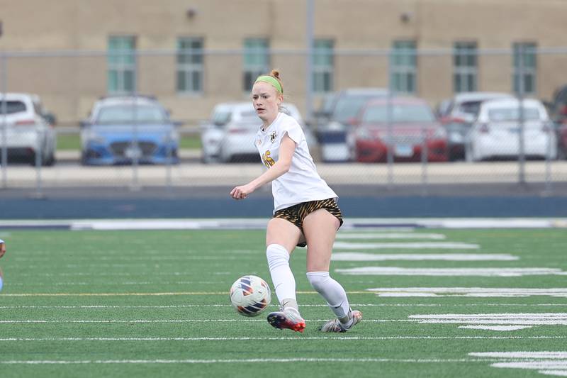 Joliet West’s Abigail Vugteveen passes the ball against Plainfield South on Thursday, April 18, 2024.