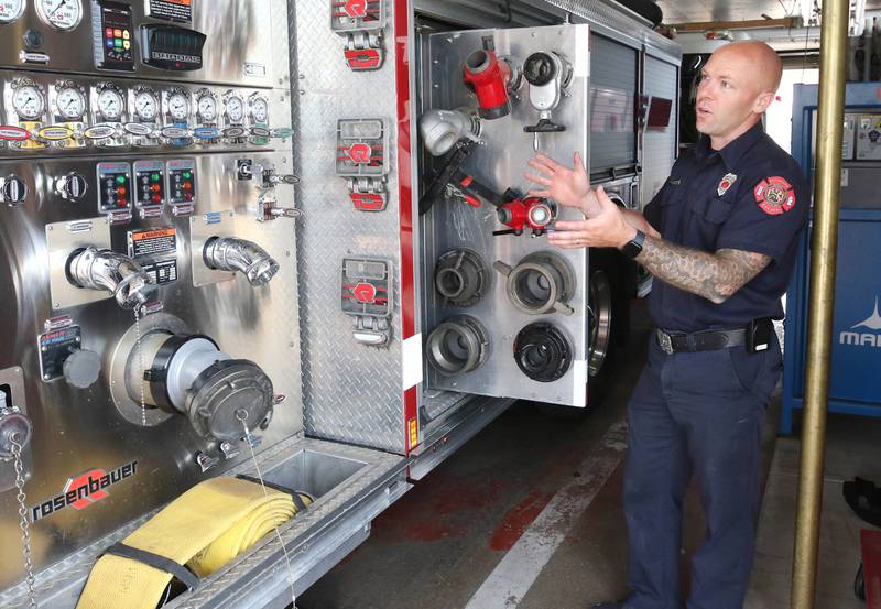 Ian Wheeler, a Sycamore firefighter/paramedic, talks about the capabilities of the one of the fire engines Tuesday, June 11, 2024, at Sycamore Fire Station 1.