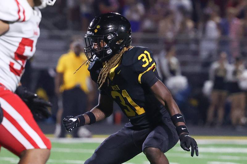 Joliet West’s Thomas Jones locks in on the play against Yorkville on Friday, Sept. 13, 2024 in Joliet.