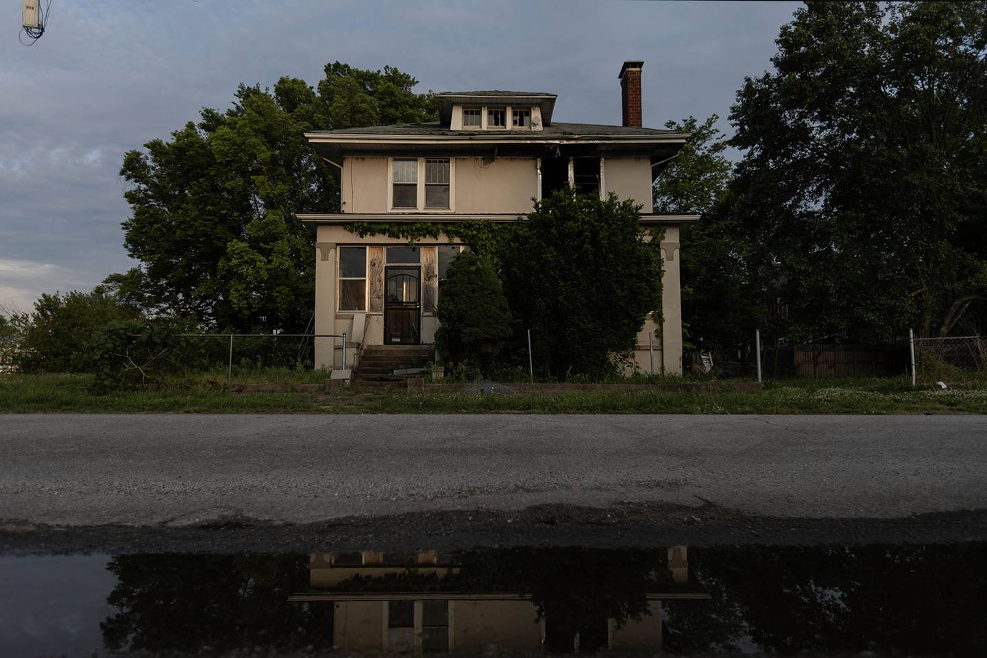 An empty and abandoned house sits on 9th street across from the St. Patrick Roman Catholic Church April 26, 2024 in Cairo, IllinoisAn empty and abandoned house sits on 9th Street across from the St. Patrick Roman Catholic Church on April 26, 2024, in Cairo.