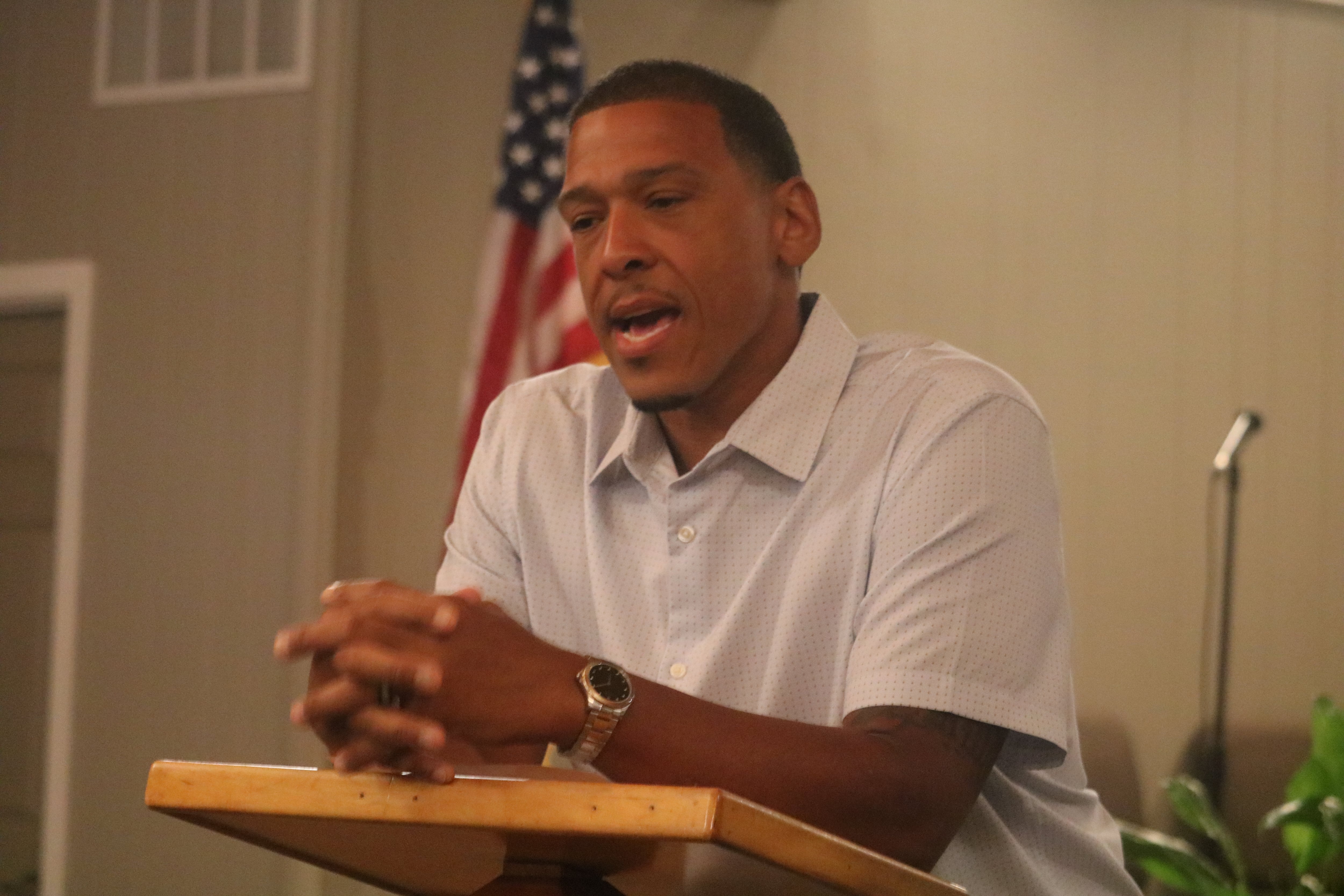 John Walker speaks July 15, 2024 before those on hand for his Ward 7 meeting held at the Rock Covenant Church in DeKalb.