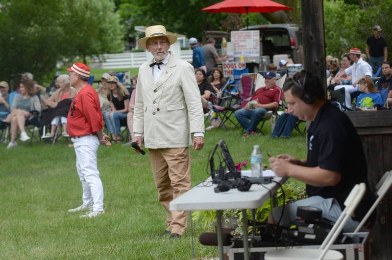 Ganymede Captain Mark Herman waits for the play-by-play announcer to give the go ahead to resume play during the vintage base ball game against the DuPage Plowboys at the John Deere Historic Site in Grand Detour on Saturday, June 8, 2024. The game was televised and steamed live.