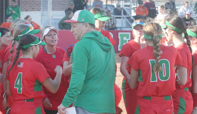 L-P head softball coach Randy Huebbe talks to his team between innings on Monday, March 11, 2024 at the L-P Athletic Complex in La Salle.