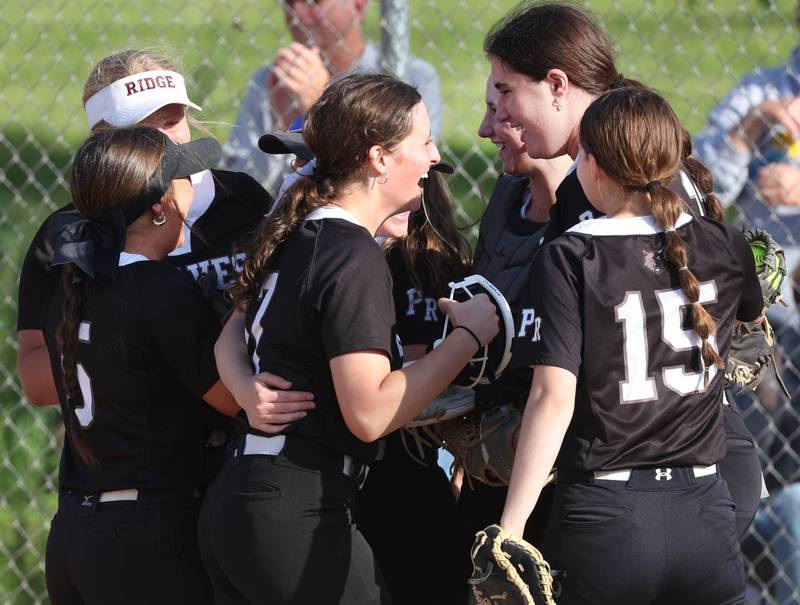 Prairie Ridge players celebrate their win in the Class 3A sectional semifinal game against Sterling Wednesday, May 29, 2024, at Sycamore High School.