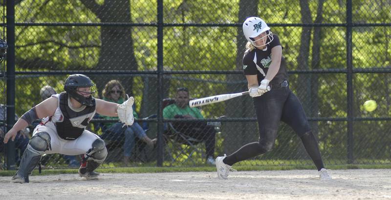 Rock Falls' Nicolette Udell powers the ball into the outfield for a single against Oregon on Monday, May 6, 2024 in Rock Falls.