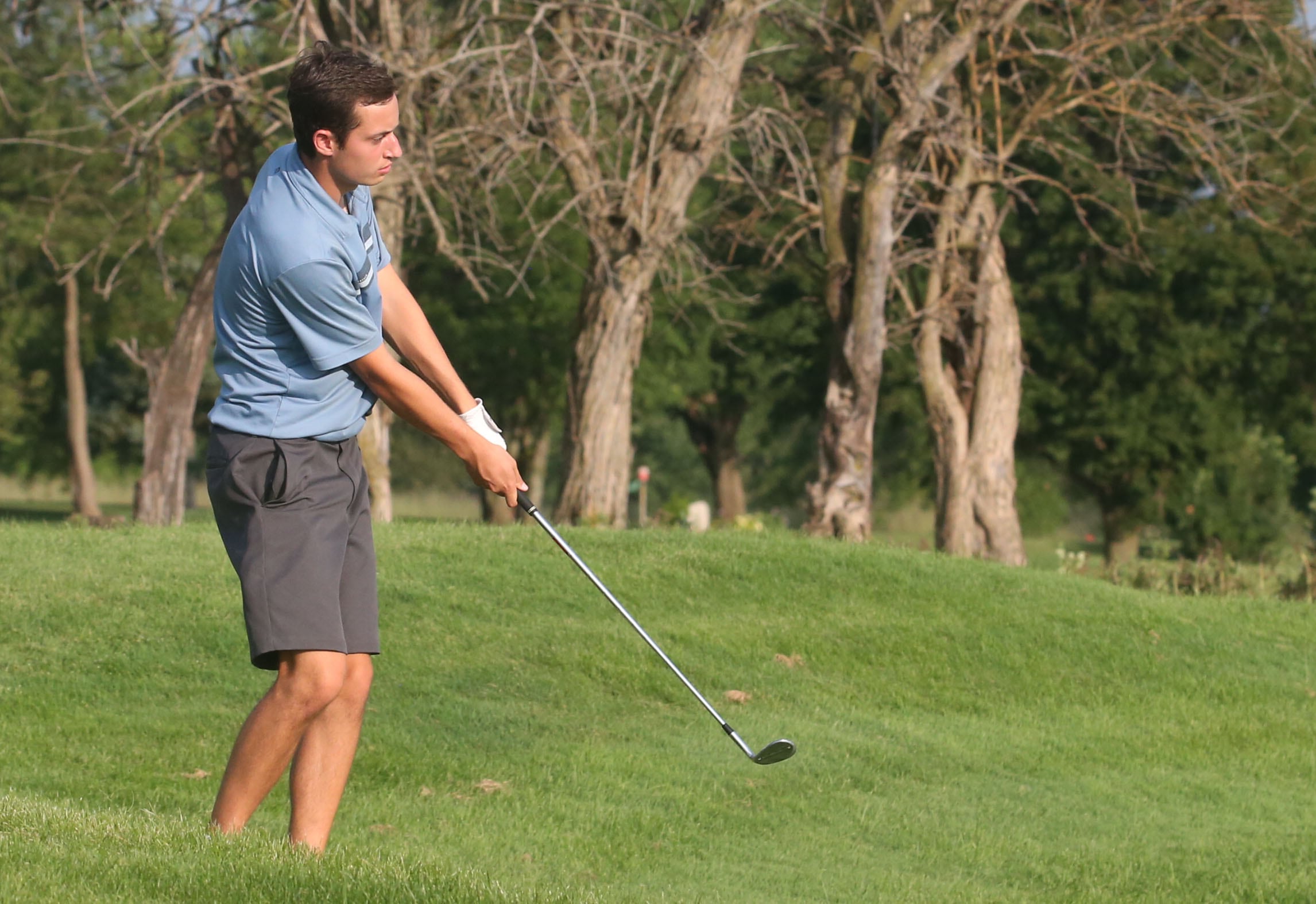 Jake Delaney golfs on the 17th hole during the Illinois Valley Mens Golf Championship on Sunday, July 28. 2024 at Mendota Golf Club.