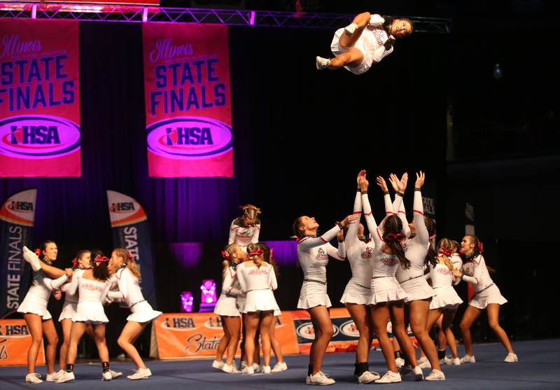 Members of the Lincoln-Way Central High School cheer team perform during the IHSA Cheer State Finals in Grossinger Motors Arena on Saturday, Feb. 4, 2023 in Bloomington.