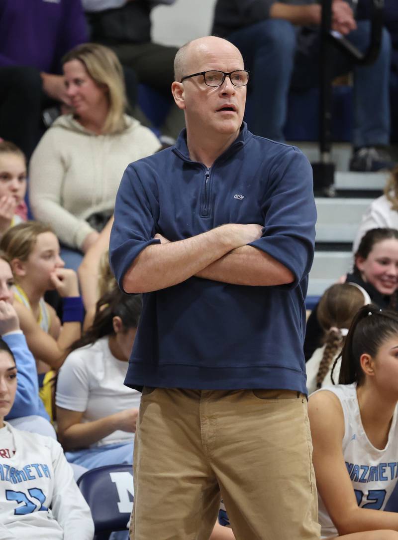 Nazareth head coach Charlie Rohlf watches the game during the fourth quarter against Benet on Monday, Jan. 29, 2024 in La Grange Park, IL.