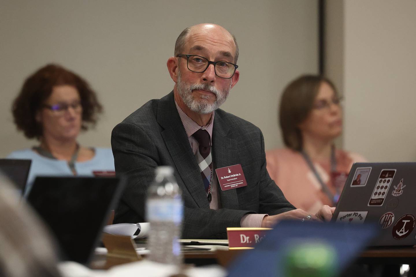Superintendent Dr. Robert McBride Jr. listens to a board member speak at the Lockport Board of Education meeting on Monday, Nov. 20, 2023, in Lockport.
