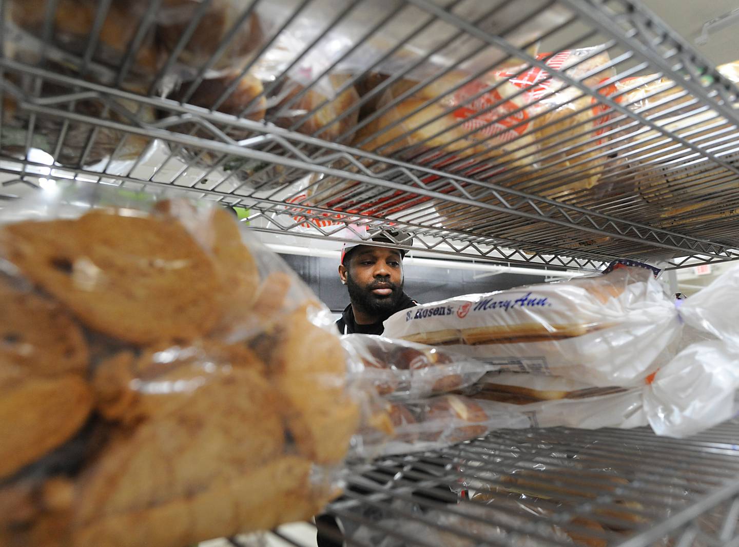 Terrell Waker, of Marengo, shops for food Monday, April 25, 2022, at the Crystal Lake Food Pantry, 42 East Street, in Crystal Lake. Food pantries across McHenry County are combating both inflation and increasing need.