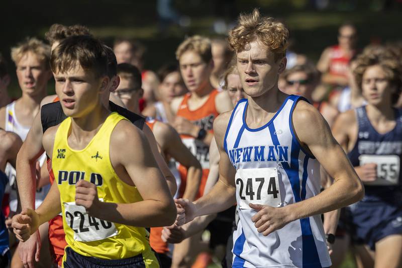 Newman’s Lucas Simpson (right) and Polo’s Kameron Grobe run side by side in the 50th Amboy Columbus Day Cross Country Invite Monday, Oct. 9, 2023.