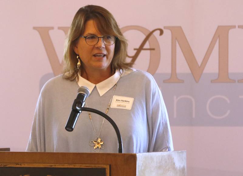 Award recipient Kimberly Hankins speaks during the Northwest Herald's Women of Distinction award luncheon Wednesday June 5, 2024, at Boulder Ridge Country Club, in Lake in the Hills. The luncheon recognized 11 women in the community as Women of Distinction.