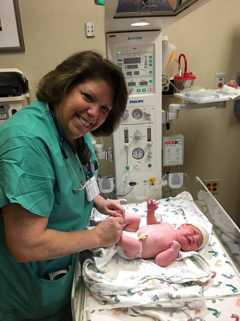 After overcoming battles with breast cancer and heart failure, labor and delivery nurse Nancy Polizzi is grateful for being given new life so that she can continue to bring new life into the world.