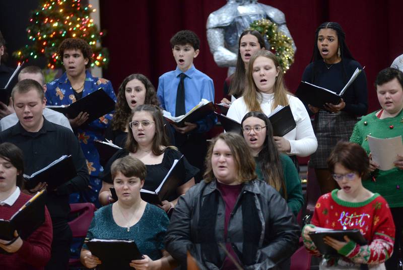 Oregon High School Choir members sing a selection under the direction of  Zach Hall at the OHS Christmas Concert held Sunday, Dec. 17, 2023 at Oregon High School.