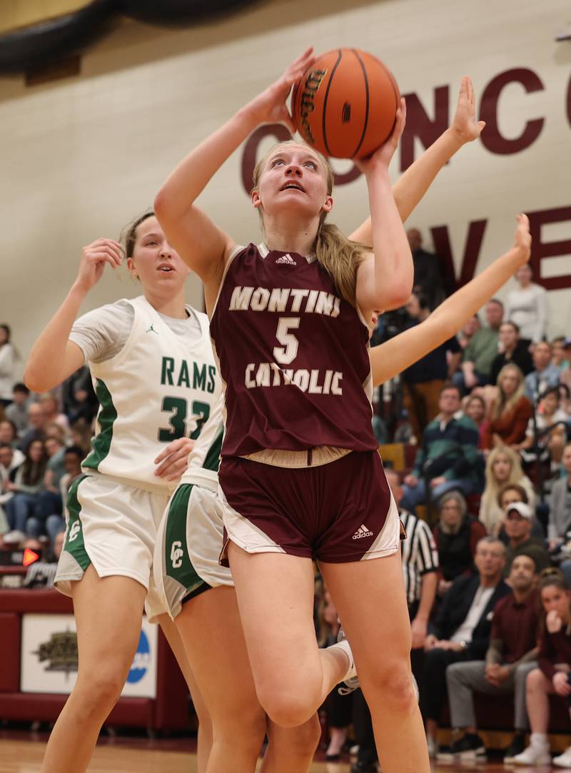 Montini Catholic’s Victoria Matulevicius (5) puts up a shot against Grayslake Central during the girls Class 3A Concordia University Supersectional basketball game on Monday, Feb. 26, 2024 in River Forest, IL.