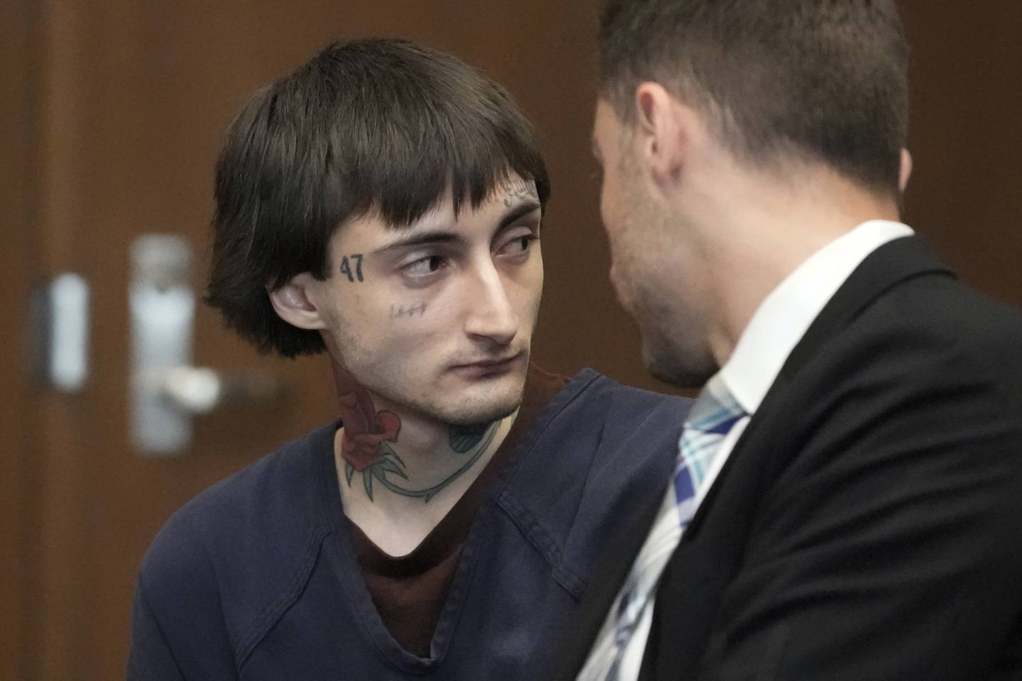 Robert E. Crimo III, left, talks to Lake County's assistant public defender Anton Trizna as he appears before Judge Victoria A. Rossetti Wednesday, June 26, 2024, at the Lake County Courthouse in Waukegan. Crimo III is charged with killing seven people and wounding dozens more in a shooting at an Independence Day parade in the suburban Chicago town of Highland Park.