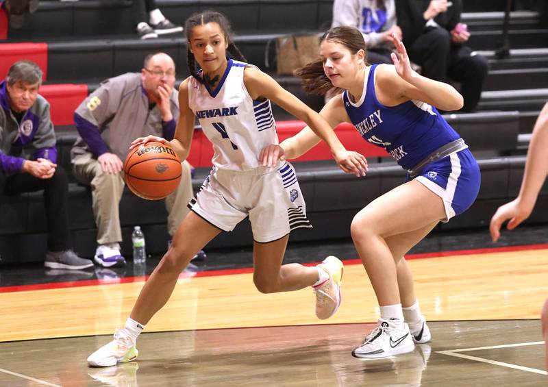 Newark’s Kiara Wesseh goes baseline against Hinckley-Big Rock's Raven Wagner Thursday, Jan. 18, 2024, during the Little 10 girls basketball tournament at Indian Creek High School in Shabbona.