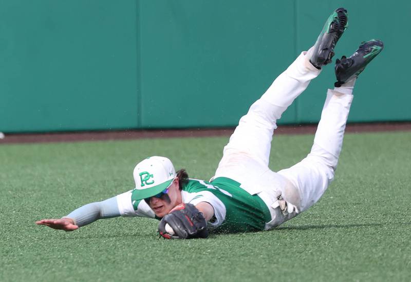 Providence Catholic's Mitch Voltz makes a diving catch during their Class 4A state semifinal win over Edwardsville Friday, June 7, 2024, at Duly Health and Care Field in Joliet.