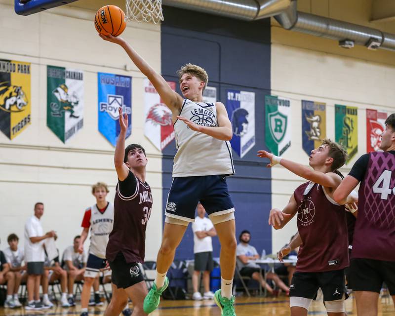 Lemont's Gabe Sularski puts up a layup at the Riverside-Brookfield Summer Shootout basketball tournament. June 22, 2024.