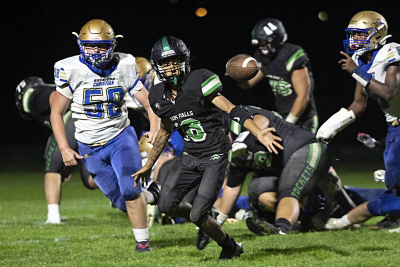 Rock Falls’ Michael Flowers loses control of a handoff on a two-point conversion Friday, Sept. 22, 2023 against Rockford Christian. The Rockets were able to pounce on the fumble in the end zone for the score.