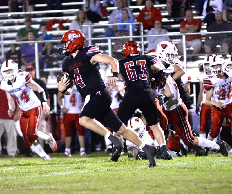 Fulton quarterback Dom Kramer runs for a gain during Friday, Aug. 30, 2024 action against Forreston at Fulton High School. The Steamers won the game 28-0.