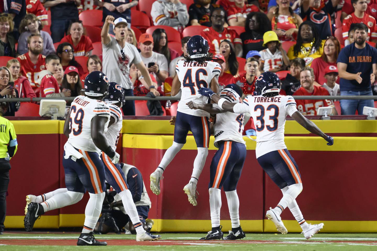 Chicago Bears cornerback Reddy Steward (46) celebrates his interception returned for a touchdown during the first half of an NFL preseason football game against the Kansas City Chiefs, Thursday, Aug. 22, 2024 in Kansas City, Mo. (AP Photo/Reed Hoffmann