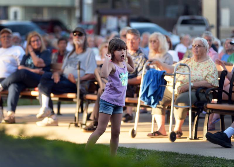 Kinsley Bishop, 6, of Byron, dances to the music of Rick Lindy and the Wild Ones at the Jamboree Music Series in Mount Morris on Friday, June 14, 2024.