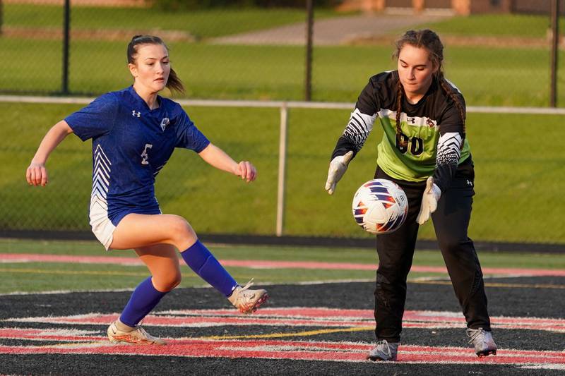 Glenbard East's Christina Chiero (00) saves the ball against Geneva during a Class 3A Glenbard East Regional semifinal soccer match at Glenbard East High School in Lombard on Tuesday, May 14, 2024.