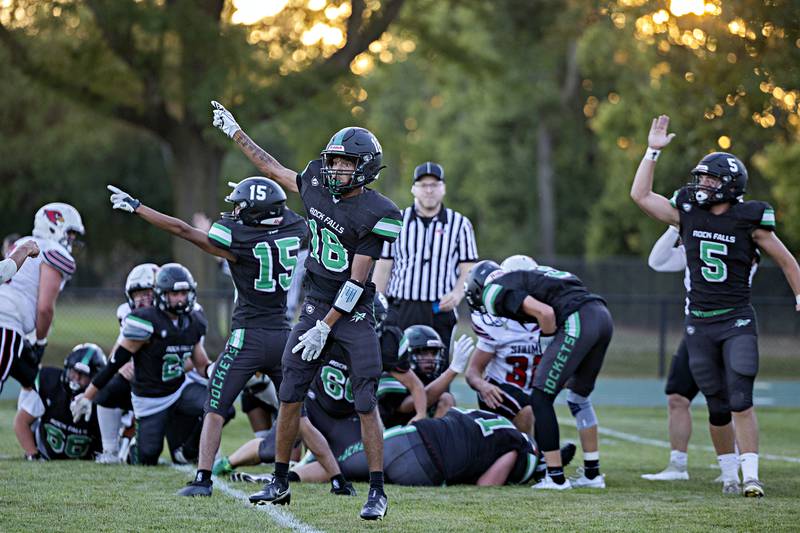 Rock Falls’ Michael Flowers signals a fumble recovery against Stillman Valley Thursday, August 31, 2023 at Rock Falls High School.