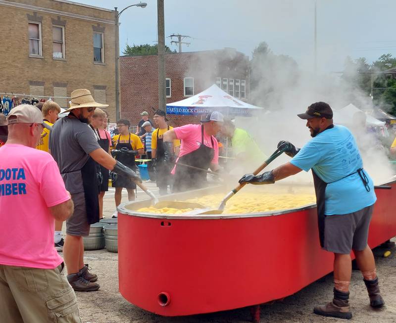 Sweet corn is boiled Sunday, Aug. 13, 2023, at the Mendota Sweet Corn Festival prior to it being distributed for free to visitors.