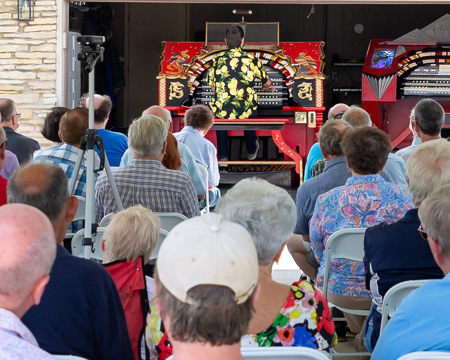 The crowd looks on while Donny Rankin plays a vintage organ from the former Oriental Theatre. July 21st, 2024.