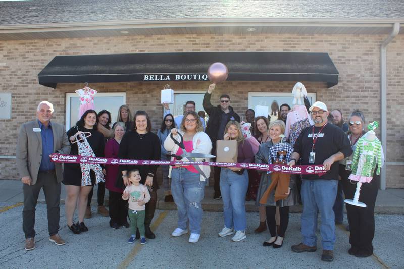 The DeKalb Chamber of Commerce welcoming Bella Boutique with a ribbon-cutting