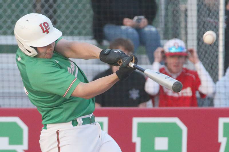 L-P's Nolan Van Duzer makes contact with the ball against Ottawa at Huby Sarver Field inside the L-P Athletic Complex on Tuesday, April 23, 2024 in La Salle.