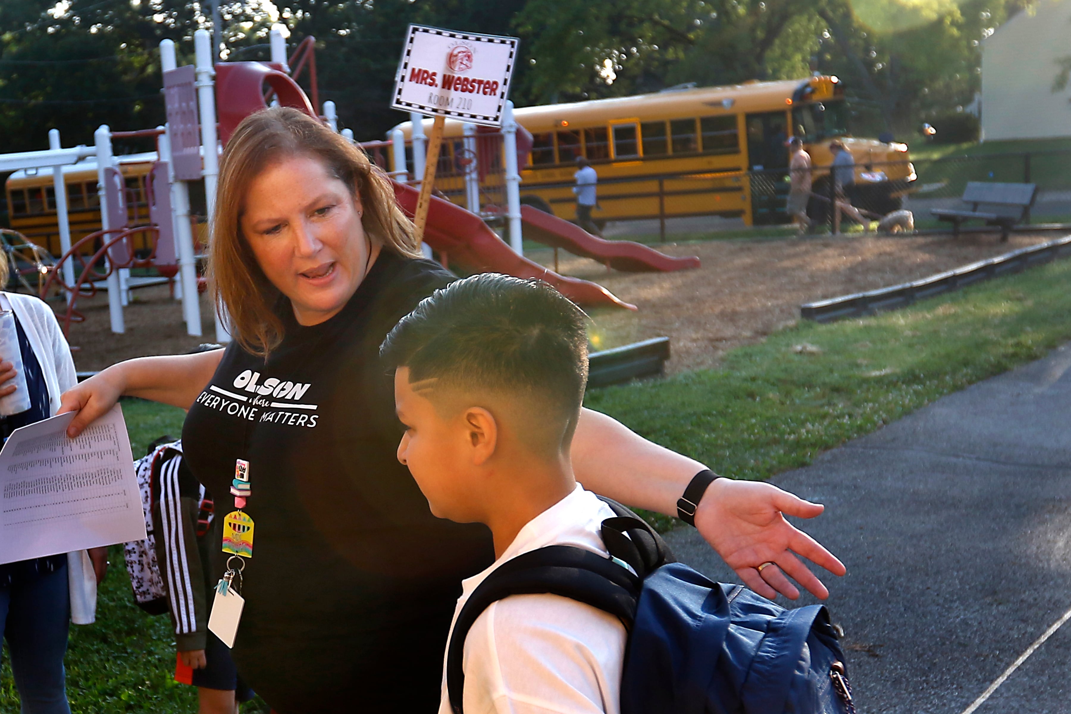 Olson principal Jennifer Malecke helps a student find is class on the first day of school on Wednesday, Aug. 14, 2024, at Olson Elementary School in Woodstock.