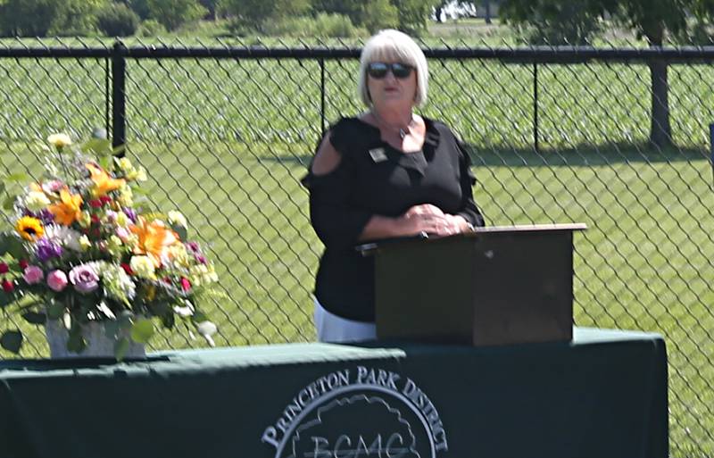 Tammie Lange executive director at Princeton Park District delivers a speech during the opening of a new a new dog park on Thursday, May 23, 2024 at Zearing Park in Princeton. The one acre park has duel sections for small and large dogs, benches, a dog water fountain and waste station. Jeanne Hutchinson has donated the funds to the Princeton Park District to fund the building of the dog park and to generate income to help maintain its care.