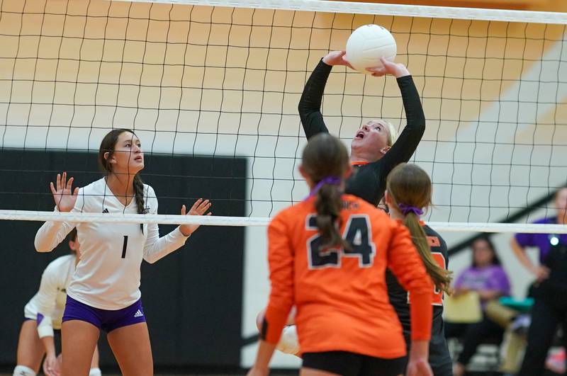 Sandwich's Jessica Ramey (5) sets the ball during a volleyball match against Plano at Sandwich High School on Tuesday, Sep 10, 2024.